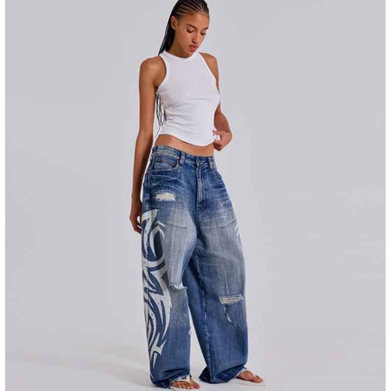Womens Distressed Relaxed-Fit Denim Jeans With A Bold Totem Print And Extra-Wide Legs