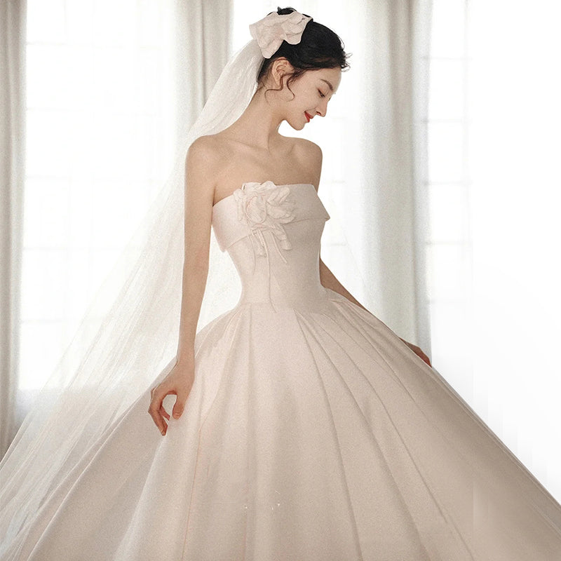 A Strapless Dress With A Big Train by Mirlaine Univers