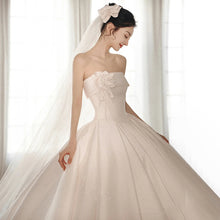 A Strapless Dress With A Big Train by Mirlaine Univers