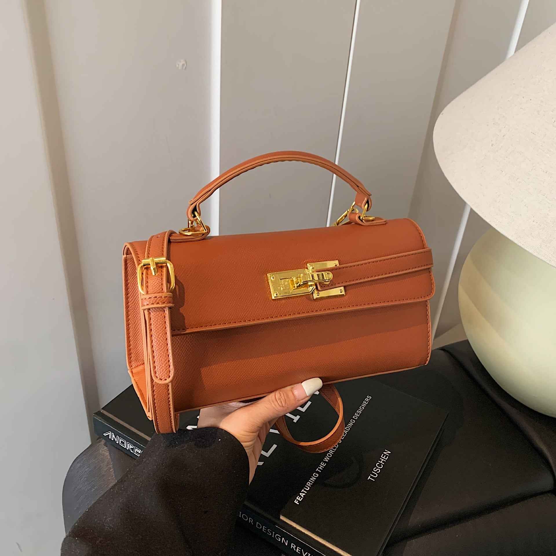 New Stylish Small Square Handbag With A Chic Lock Closure
