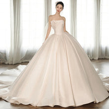 A Strapless Dress With A Big Train by Mirlaine Univers