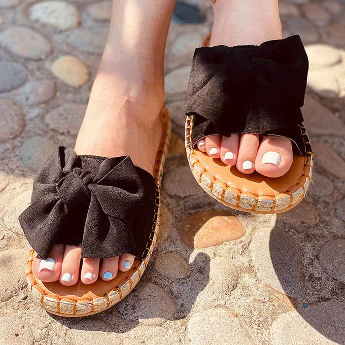 Nouvelles sandales plates à nœud pour femmes, sandales de plage, chaussons d'extérieur, sandales couleur unie, en stock