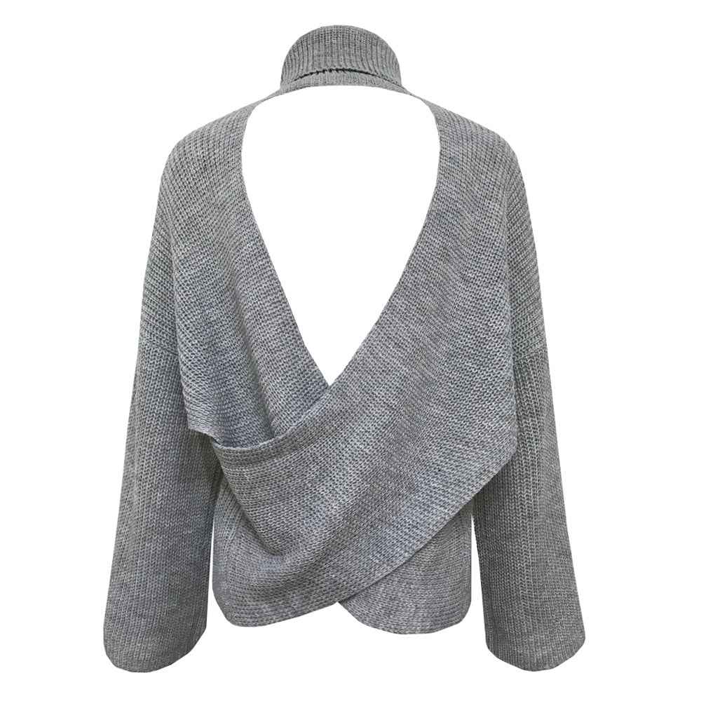 Pile up loose sweaters with crossed necks and halter backs