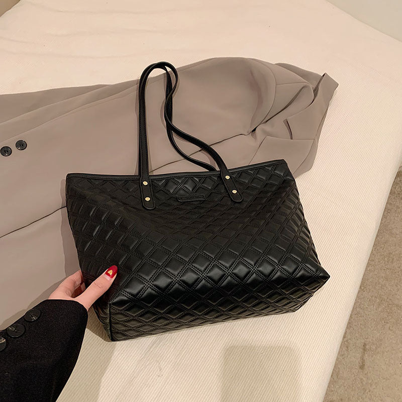 Commuter Shoulder Bag With A Diamond-check Pattern by Mirlaine Univers