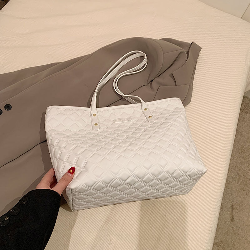 Commuter Shoulder Bag With A Diamond-check Pattern by Mirlaine Univers