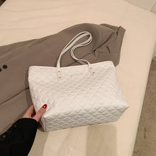 Commuter Shoulder Bag With A Diamond-check Pattern by Mirlaine Univers