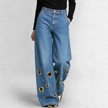 High-waisted Loose-fit Denim Jeans With Cutout Detailing And Metal Eyelets