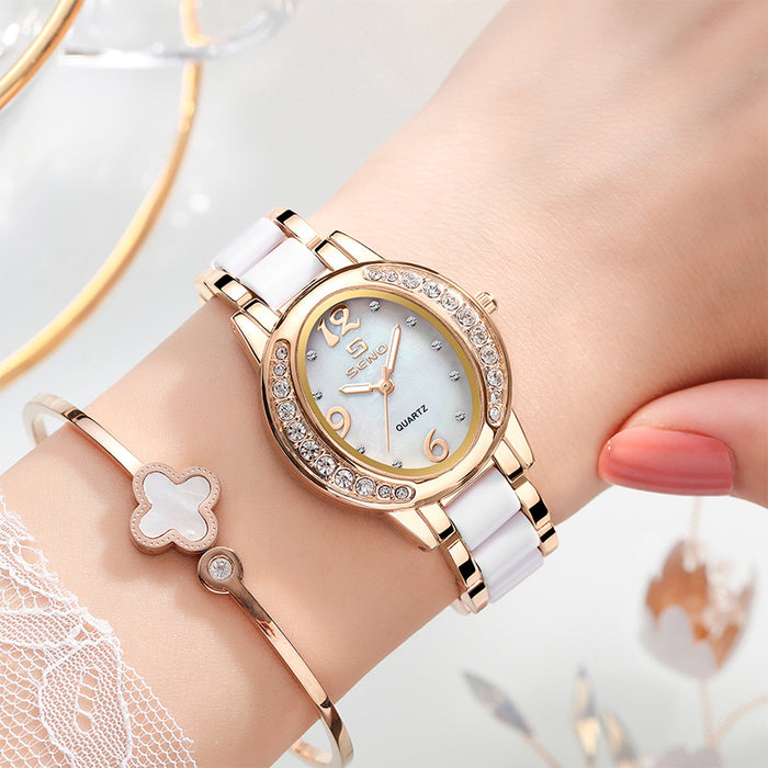 Nouvelle montre élégante pour femme, boîtier ovale incrusté de diamants, mouvement à quartz étanche avec cadran luminescent