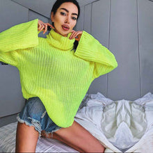 Pile up loose sweaters with crossed necks and halter backs