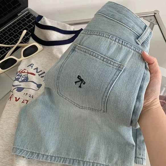 Shorts en jean brodés d'un nœud pour femme