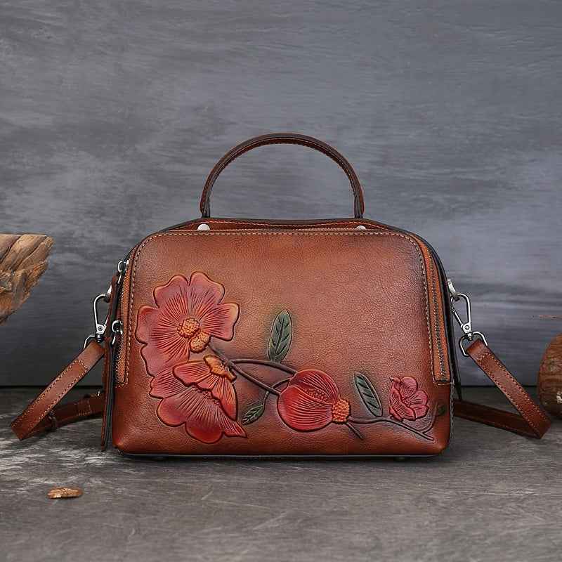 Vintage Cowhide Pillow Bag With Embossed Detailing And A Handheld Design