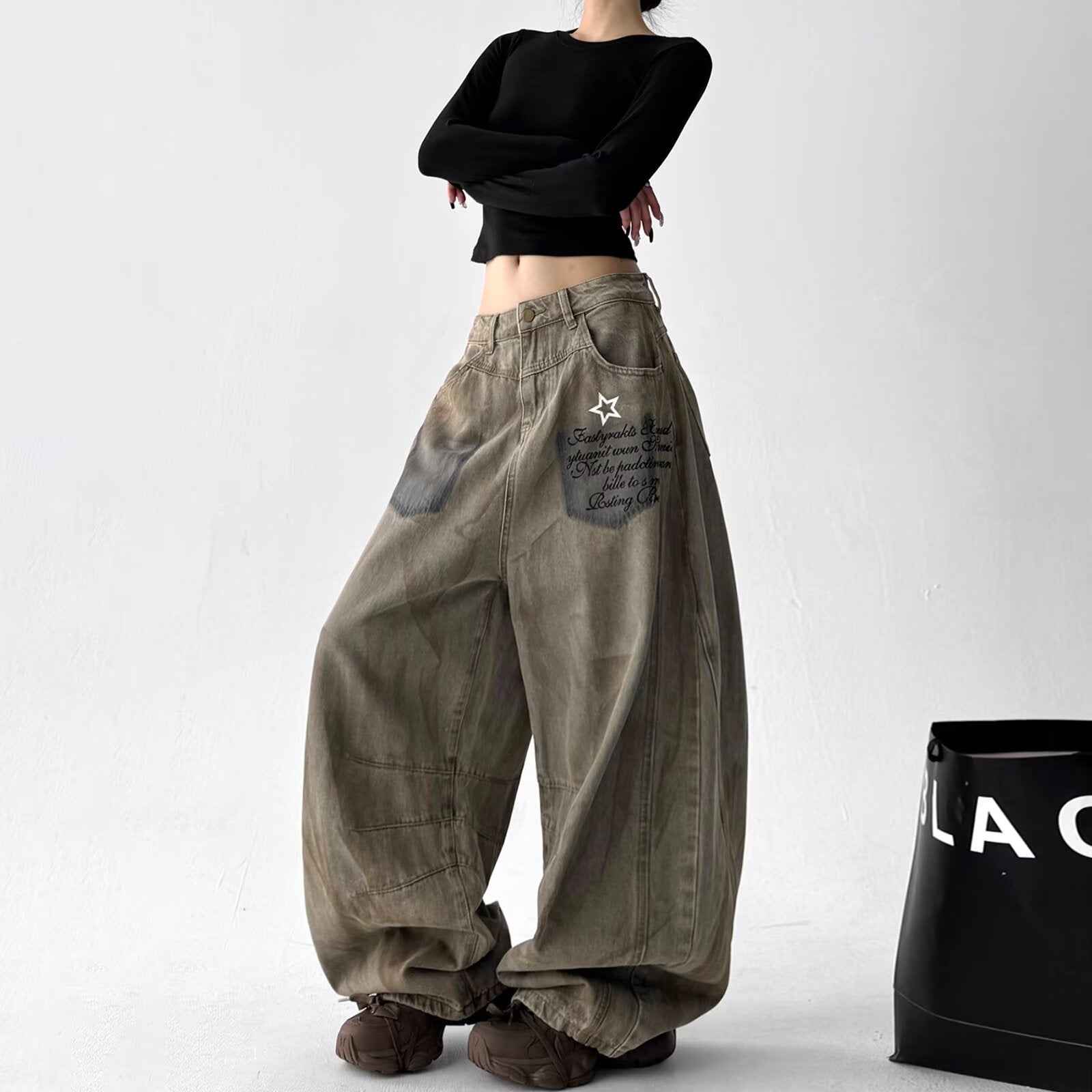 Loose-fit Wide-leg Pants With A Curved Hem For Women
