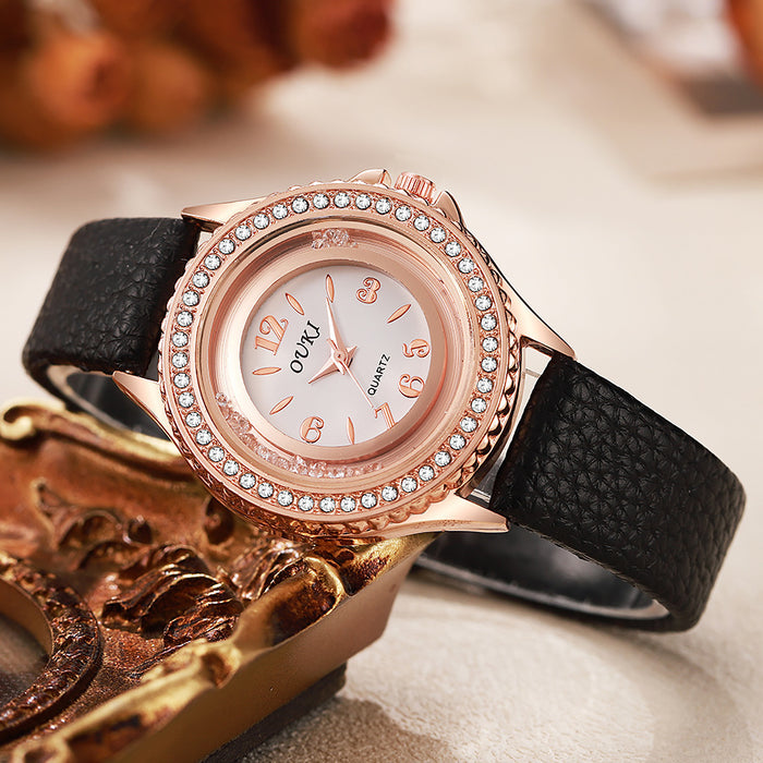 Montre femme ronde, élégante et minimaliste, ornée de strass