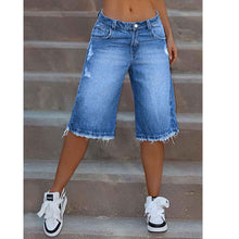 Ripped Denim Shorts With Raw Edges
