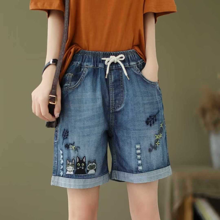 Short en jean à taille élastique et lacets avec broderie chat de dessin animé