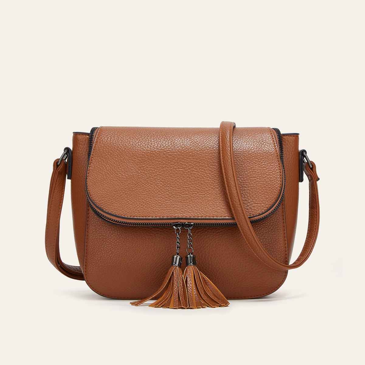 European And American-style Fashionable Flip-top Saddle Bag With Tassels