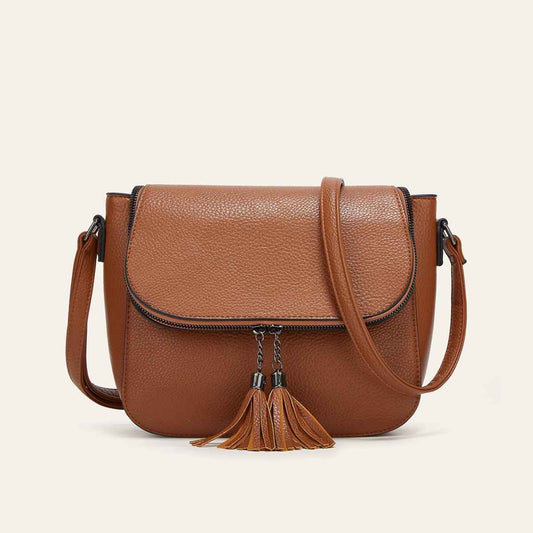 European And American-style Fashionable Flip-top Saddle Bag With Tassels