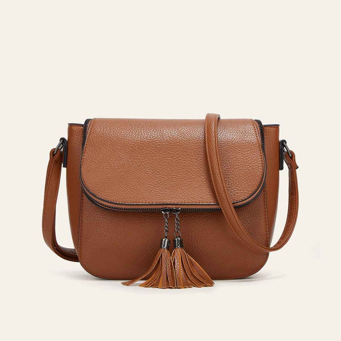 European And American-style Fashionable Flip-top Saddle Bag With Tassels