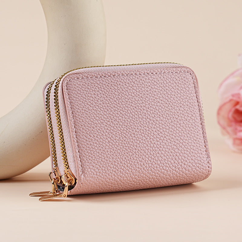 Clutch Wallet With Dual Zippers And Multiple Card Slots by Mirlaine Univers