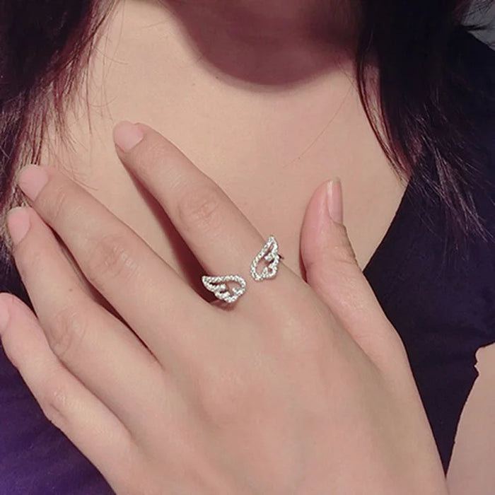 Bague style coréen ailes d'ange, anneau ajustable avec strass pour femme, bijou de couleur argent pour fête ou anniversaire