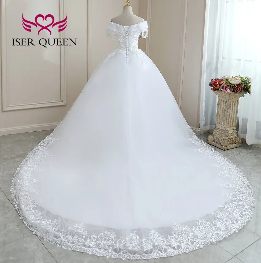 Customized Crystal Beaded Tassel Wedding Dress 2026 Ball Gown Pretty Lace Plus Size Europe Style Bride Dress For Woman WX0268
