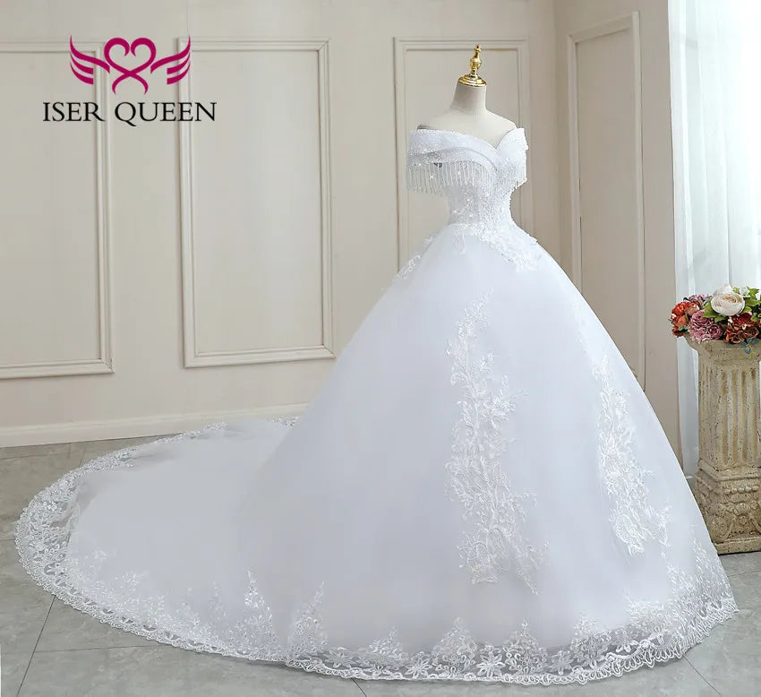 Customized Crystal Beaded Tassel Wedding Dress 2026 Ball Gown Pretty Lace Plus Size Europe Style Bride Dress For Woman WX0268