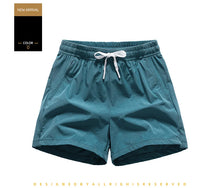 New Summer Mens Sports Sweatpants Pockets Gym Casual Shorts Basic Lightweight Pants Running Jogging Beach Shorts Men Swimwear