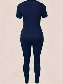 2026 women's new Paris printed two-piece set, casual short sleeved round neck T-shirt and tight pants long pants set