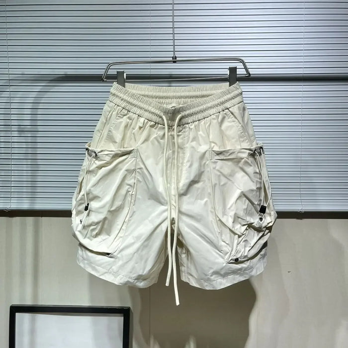 Shorts d'été pour homme, style outdoor, effet brillant, sensation de fraîcheur, séchage rapide, coupe large, poches fonctionnelles, style workwear tendance