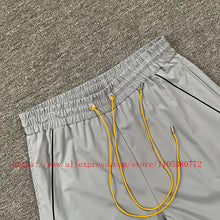 2026 New  RHUDE Men's Print Casual Shorts Loose Fit Nylon Drawstring Basketball Street Beach Shorts with Pockets Fast Delivery