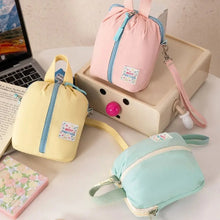 Petit sac de rangement portable pour serviettes hygiéniques, trousse de toilette et de maquillage style macaron, organisateur polyvalent