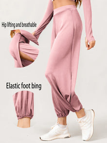 Pantalon de yoga à taille élastique et fente haute pour femme