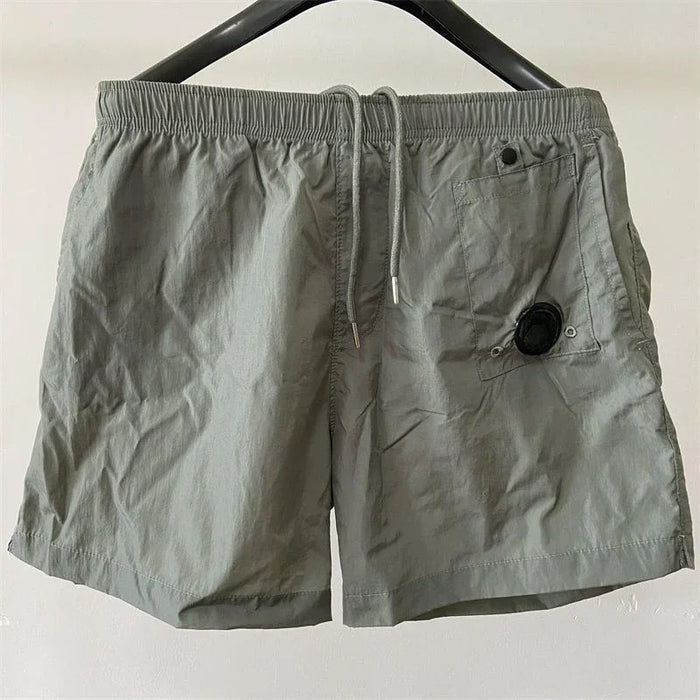 Shorts de sport amples en nylon pour hommes, longueur genou, décontractés, de luxe, de qualité supérieure, pour jeunes, pour la plage, longueur 5 points