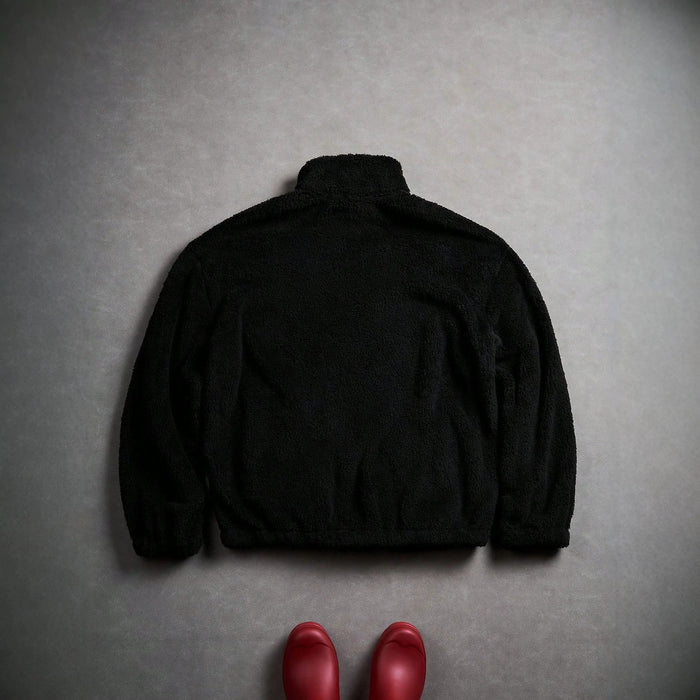 Black Furry Jacket With A Zipper And Embroidery On The Left Chest