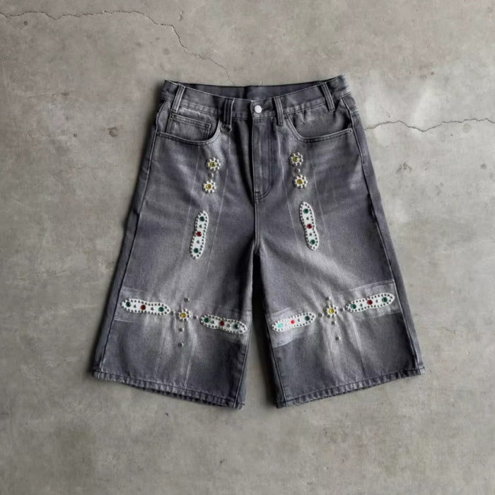Shorts en cuir à patchwork et strass cloutés