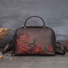 Vintage Cowhide Pillow Bag With Embossed Detailing And A Handheld Design