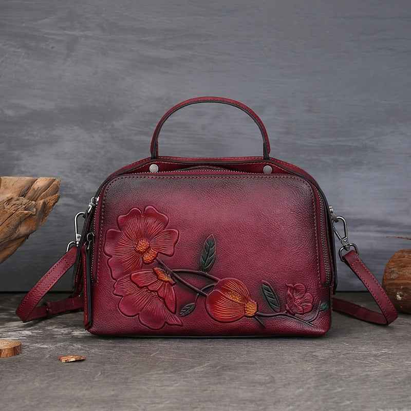 Vintage Cowhide Pillow Bag With Embossed Detailing And A Handheld Design