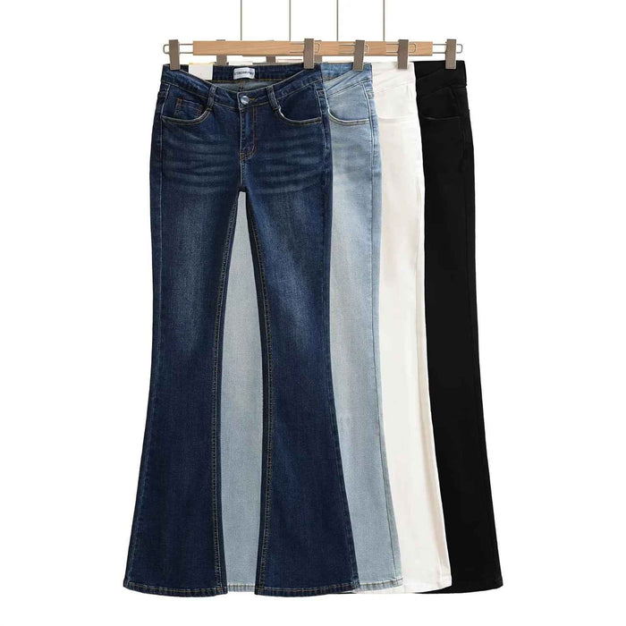 Jean slim en denim délavé avec rembourrage au niveau des hanches pour allonger les jambes