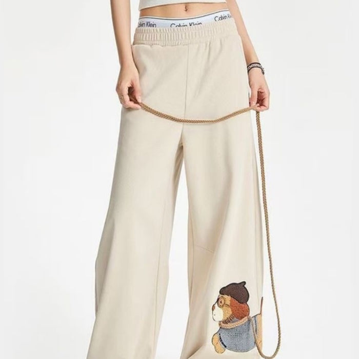Embroidered Wide-Leg Pants — Unique Detail, Statement Style