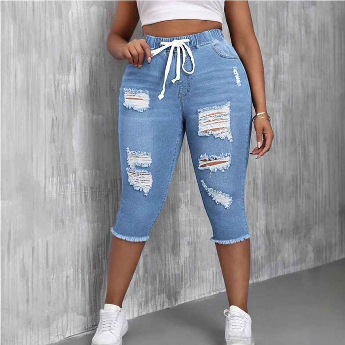 Jean amincissant déchiré grande taille pour femme