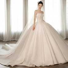 A Strapless Dress With A Big Train by Mirlaine Univers