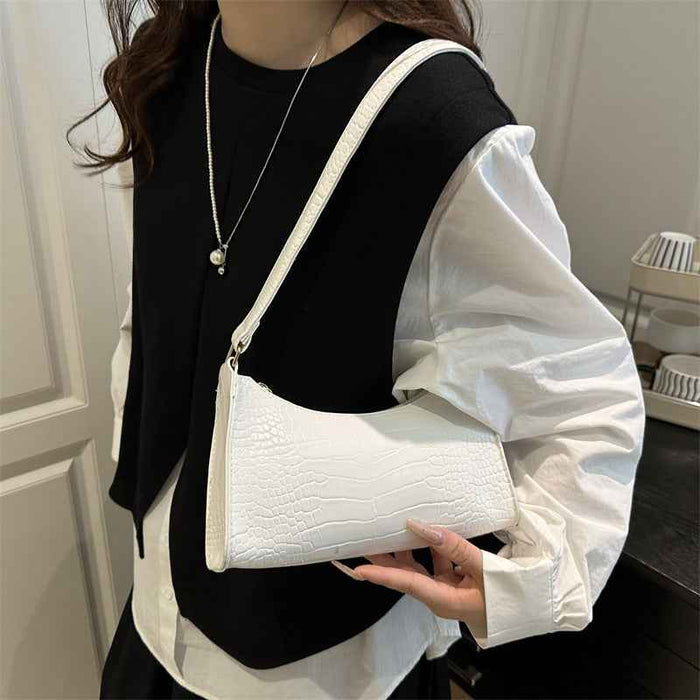 Sac cabas et porté épaule minimaliste et texturé, style français
