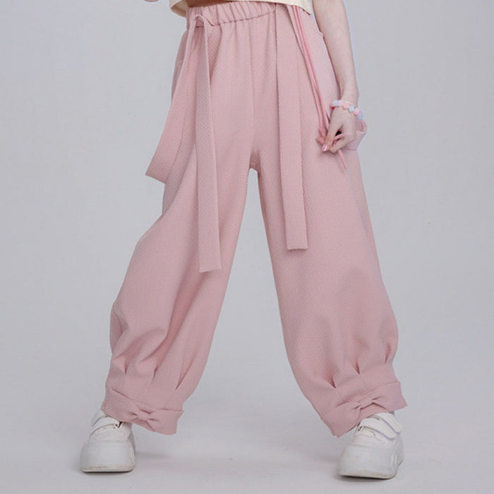 Salopette courte à bretelles pour femme en pur coton, motif lapin, couleur rose poudré, avec cordon de serrage