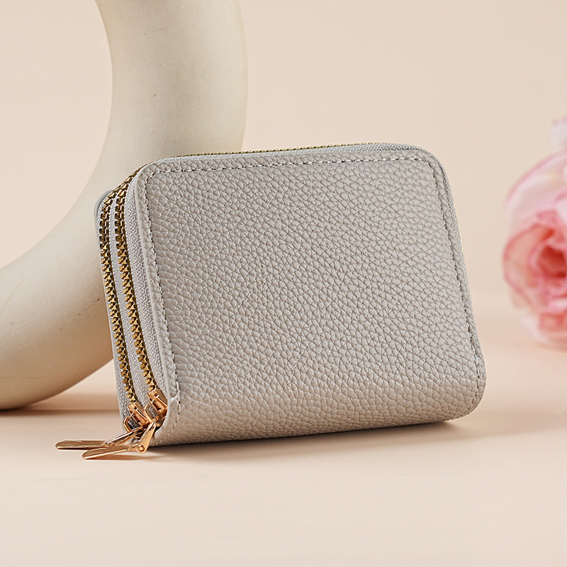 Clutch Wallet With Dual Zippers And Multiple Card Slots by Mirlaine Univers